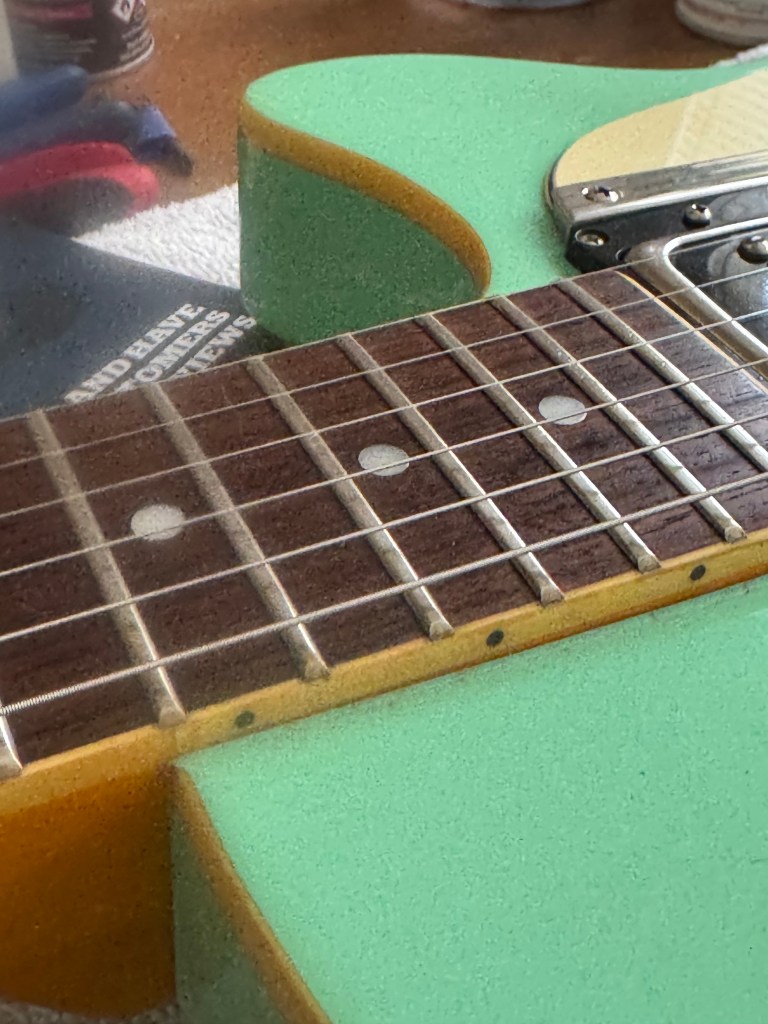 Fret dressing in Swansea, UK.